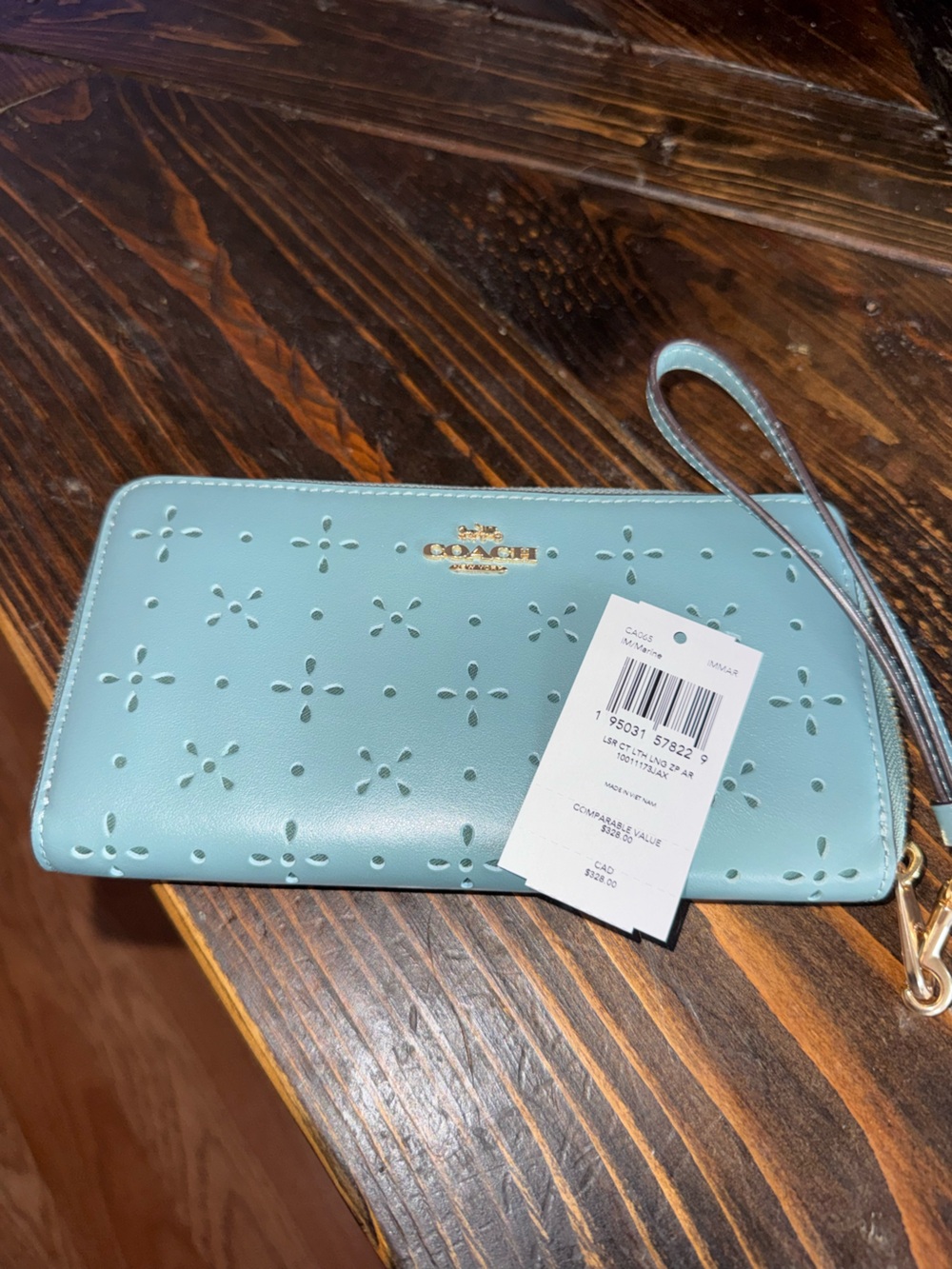 Coach Perforated Leather Wristlet in Aqua Blue with Gold Logo